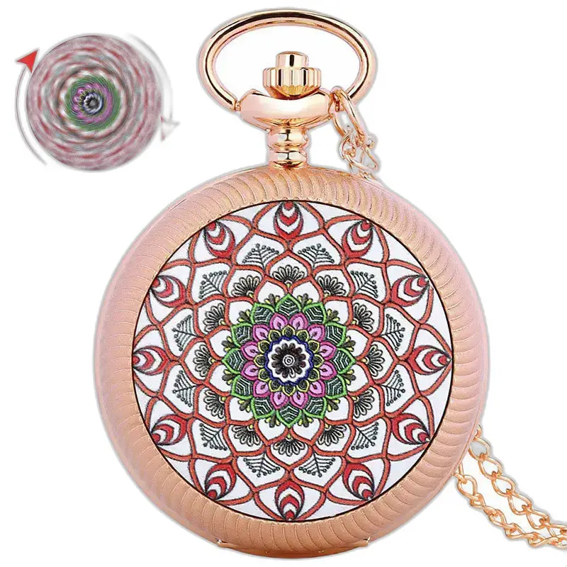 Orologio da tasca in oro rosa con mandala e pietre smeraldo sul giradischi