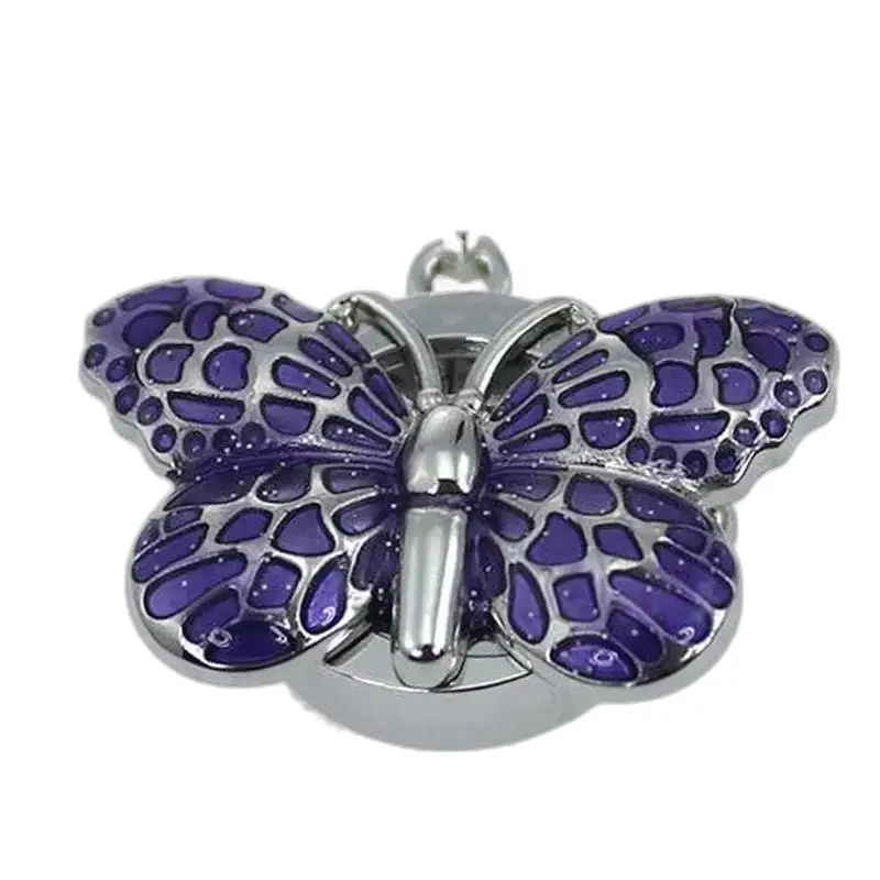 Porta borsa a forma di farfalla viola e argento. Orologio Collana Butterfly Chic da Donna